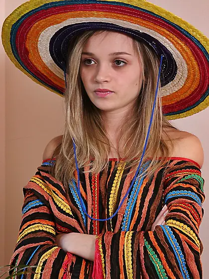 Hot teen gal Kristina Fey takes off her poncho and shows us her