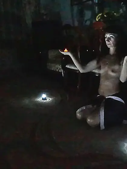 In darkness with candles