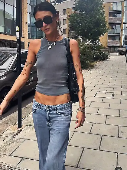 Skinny girl in low-rise jeans