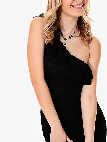 Busty golden haired model Anna Tatu shows her black dress as wel