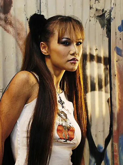 Asian college girl in checked skirt and pantyhose Mia Smiles in