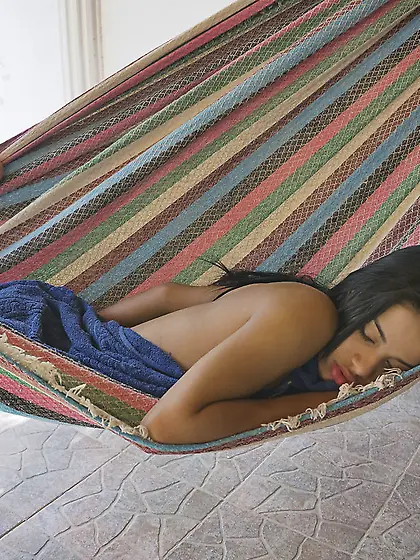 Busty brunette wearing sexy lingerie is massaging wild tits and