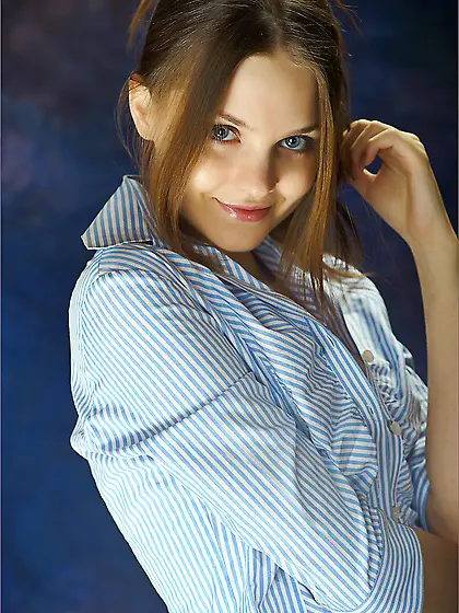 Passionate and hot Amelie Femjoy poses on the set and reveals he