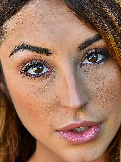 Smoldering and somewhat vulnerable babe posing naked poolside