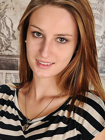 Foxy brunette sits brown