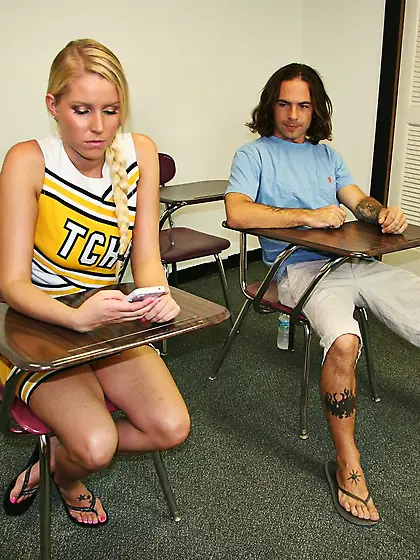 Frisky teenager Vanessa Cage lifting up the top,  baring tits and