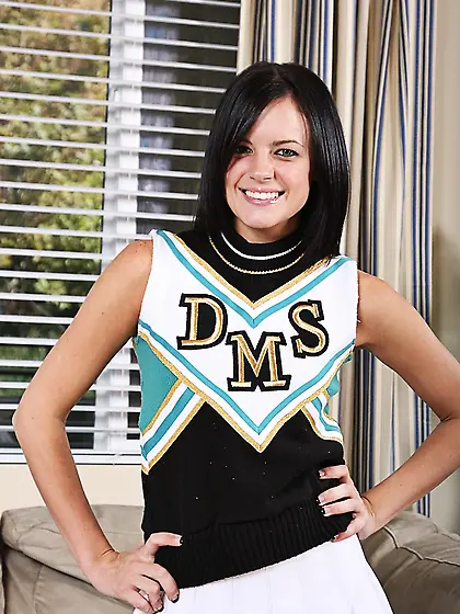 Cheerleader girl Stephanie Sage takes off her uniform and white