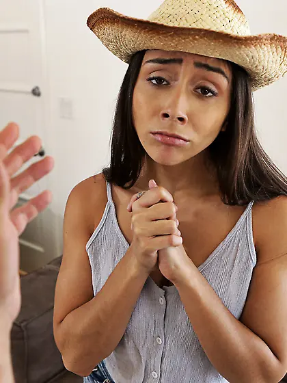 Girl in a cowboy hat is happy with stepbrother who shoves his co