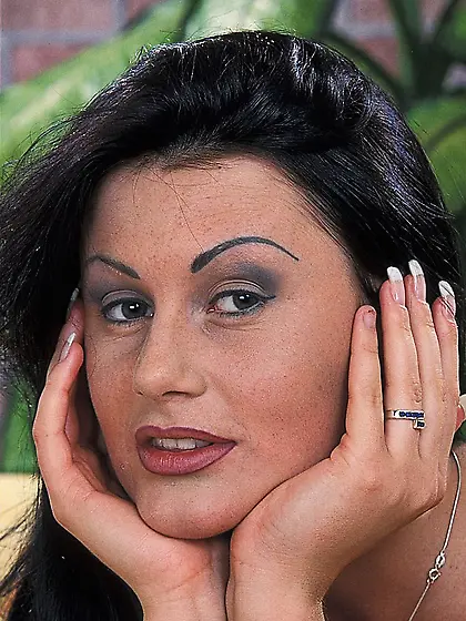 Classy brunette model Karma Rosenberg strips her purple corset a