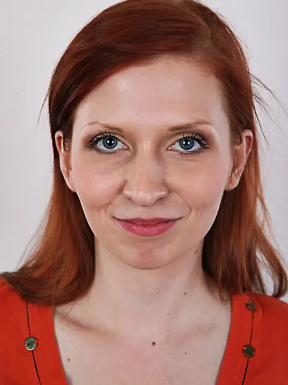 Redhead hottie standing straight