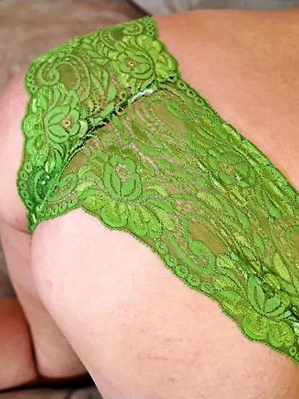 Megan Joy drops down her green lingerie and gets her nasty pussy