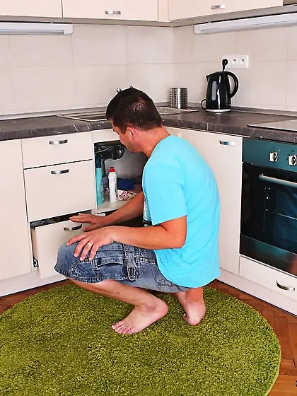 Karina E lures her mom's BF into a hardcore fuck in the kitchen