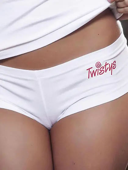 Brunette sweetie Capri Anderson takes off her lingerie and plays