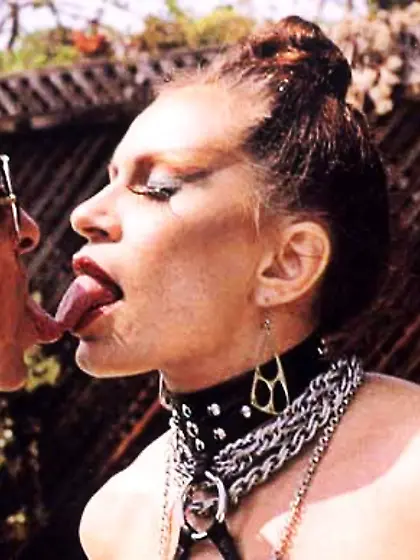 Old slut in a collar taking a hot facial