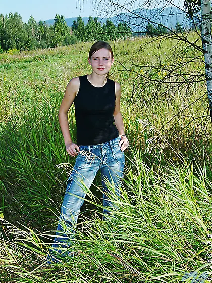 Passionate madam wearing black lingerie is showing striptease sk