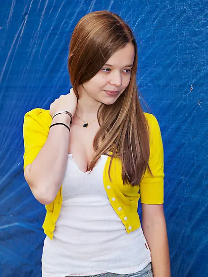 Adorable slim long-haired teen