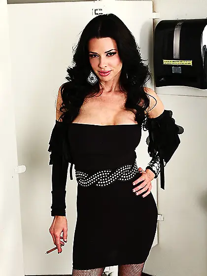 Julia Ann looks more than hot in a tight dress.  She is a lesbian