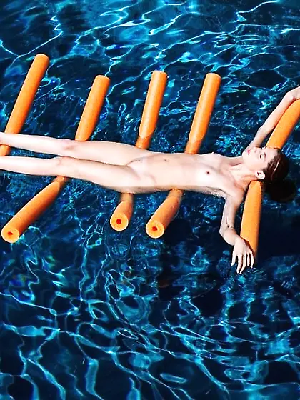 Two auburn-haired hotties enjoying tender love-making under the