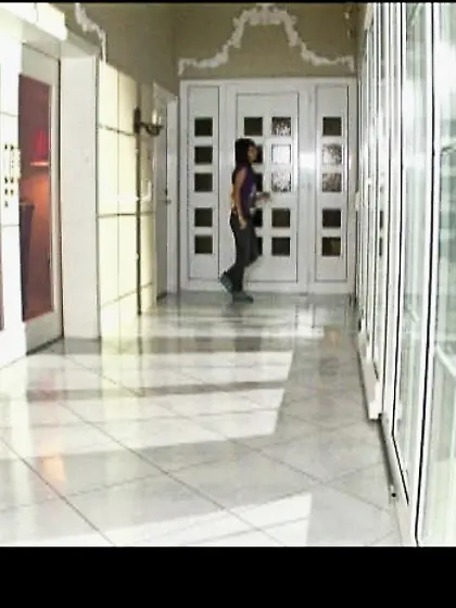 Mia Moon kneels before her hung lover and sucks her lover's