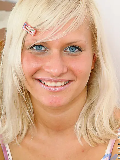 Sweet looking Euro blondie shows her cunt and covers her body wi