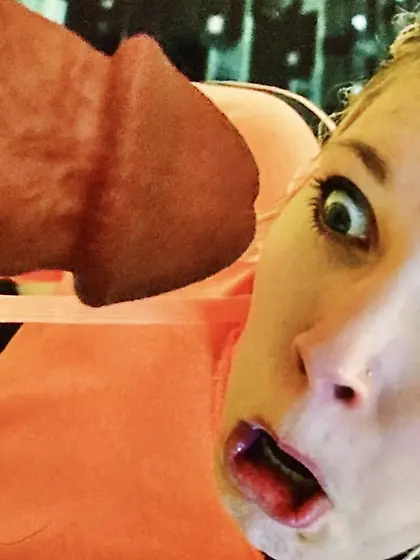 Staring down the barrel of her new toy