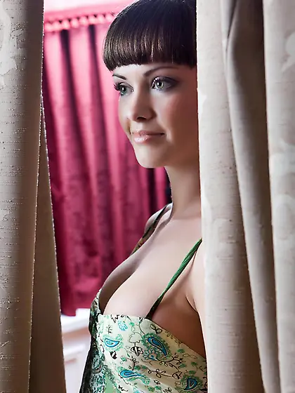 Sexy dark haired doll Candy Rose is baring off boobs and pinchin