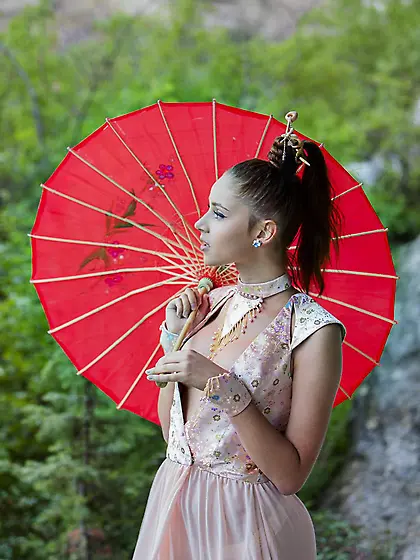 Lovely redhead babe Red Fox poses outdoors and gets rid of her v