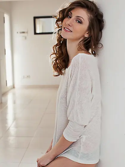 Handsome brunette babe Karen K exposes her nice slender body in