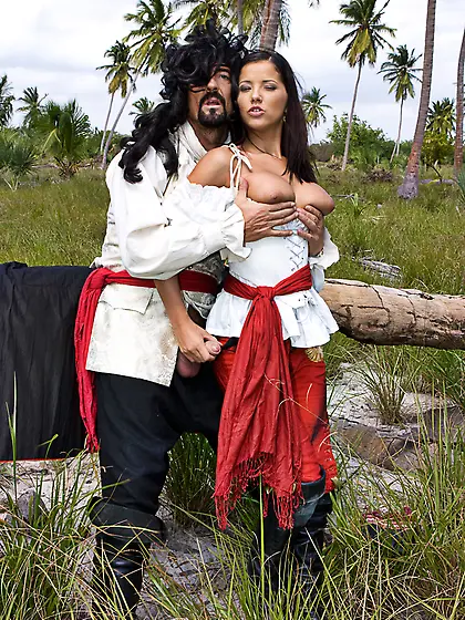 Bosomy brunette Angel Dark dressed in white and red takes hard f