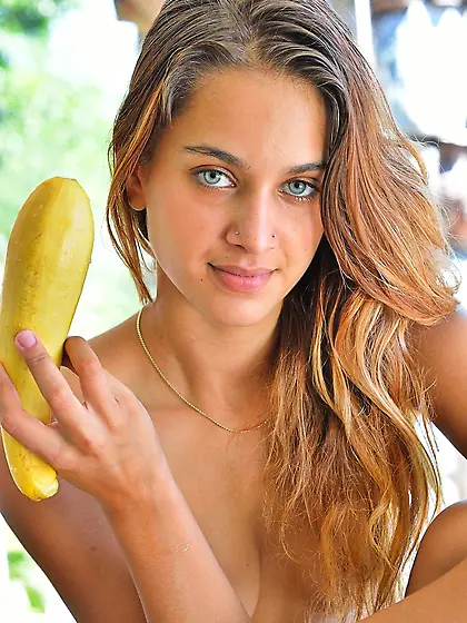 Skinny babe with small breasts fooling around while naked outdoo