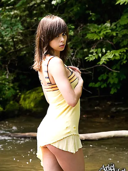 Ariel Rebel goes to a local river for a swim and for making pass