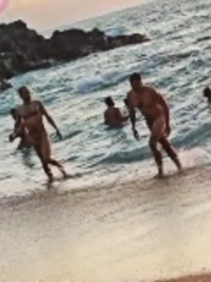 Men nude at the beach