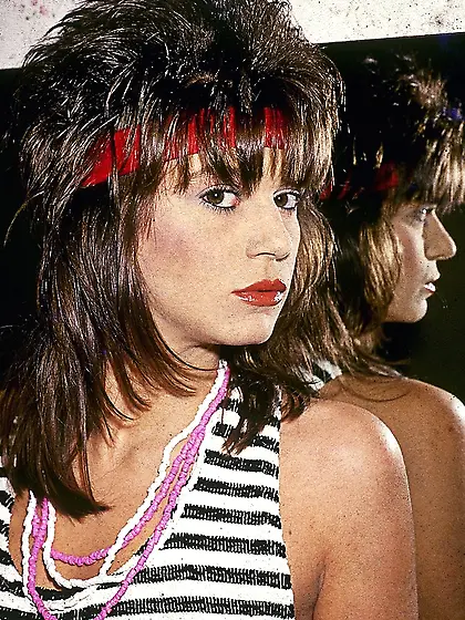 Luscious babe wearing red