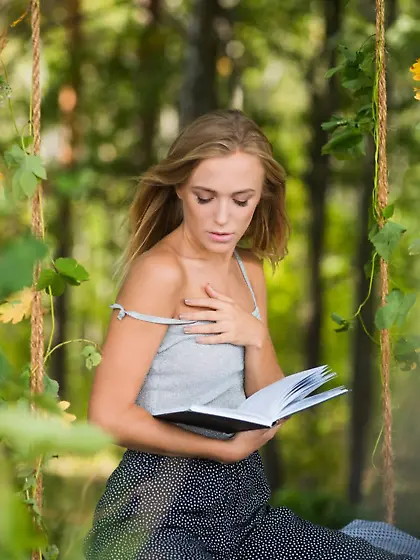 Unforgettable blonde bookworm posing totally naked on a swing Vi