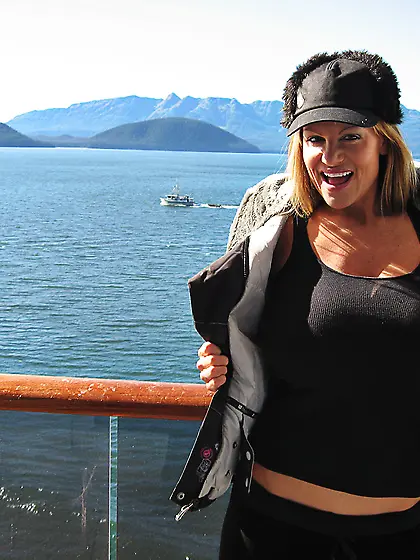 Busty blonde bimbo Kelly Madison strips and shows her massive ro