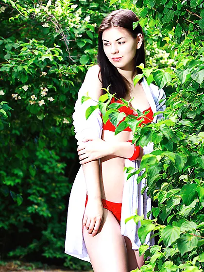 Red lingerie teen decides to strip naked in the middle of a road