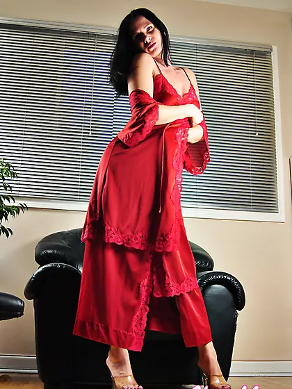 Pretty brunette babe Mina in red dress chair masturbating