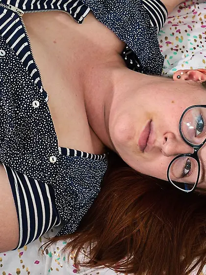 Redheaded beauty showing what she can while teasing hard