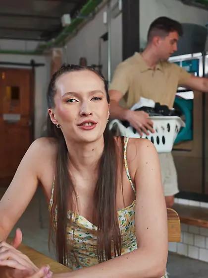 Long-haired vixen with natural boobs gets fucked in the laundry