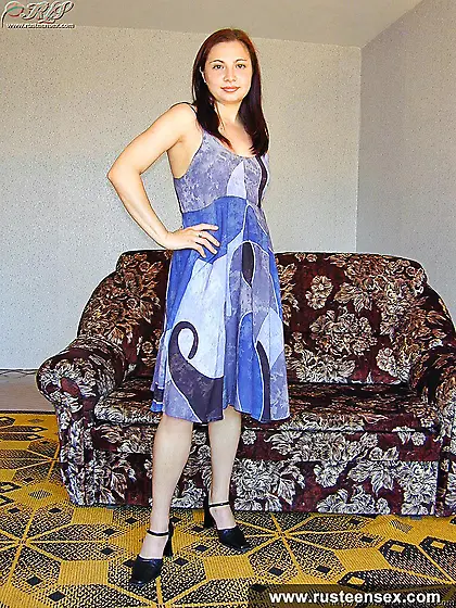 Russian teen brunette playing with her shaved pussy