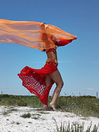 On top with an orange shawl