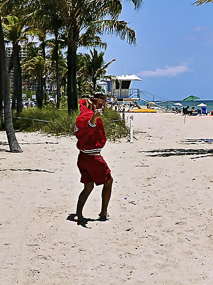 Freaky MILF lady seduces a young man on the beach,  she takes him