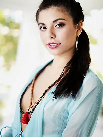 Petite Latina pornstar slowly strips to show her small boobs and