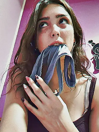 Panties in her mouth
