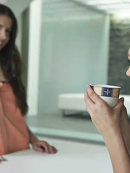 Flat-chested brunette gets easily seduced by her sexy girlfriend