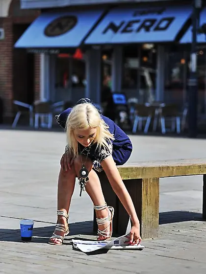 Enticing slim blonde gets horny outdoors and takes off dress whe