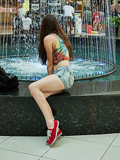 Long-haired brunette freshie red