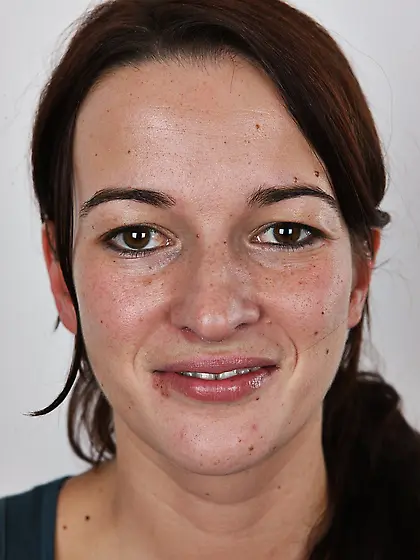 Female in polka-dot bra gets completely naked posing on the stoo