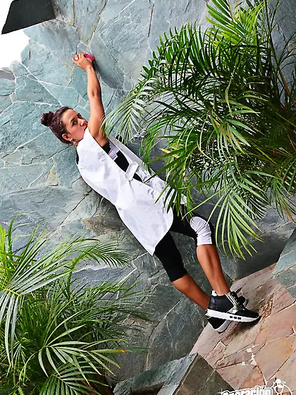 Alluring babe with a firm ass is going to expose her slit