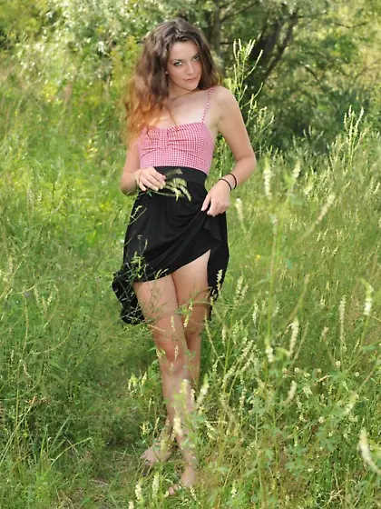 Emmanuelle is looking hot in her black and pink dress today.